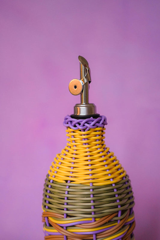 MÆGEN hand-woven olive oil pourer with yellow and lilac stripes