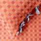 Pair of Cotton Pillowcases in Apricot Checkerboard